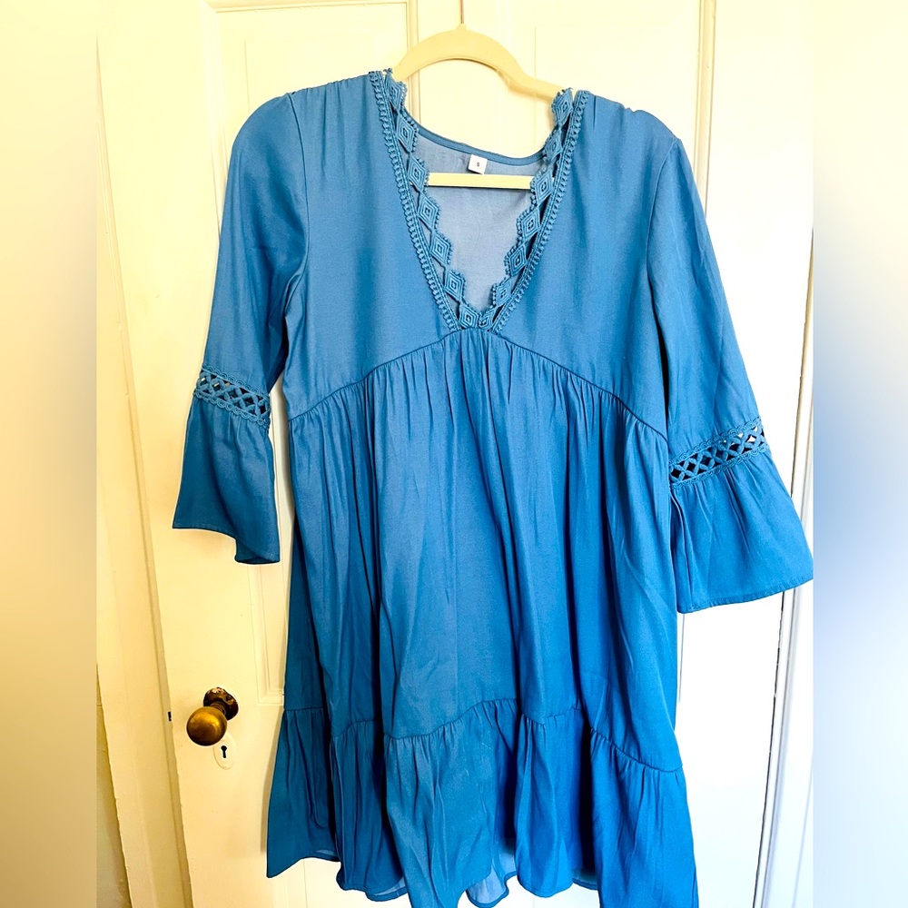 Blue dress, lightweight. Wore once last year.